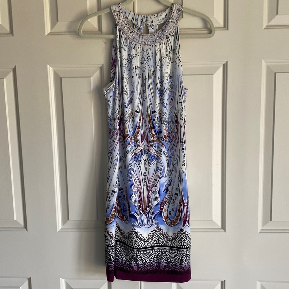 White House black market mini printed dress with beading around neck line